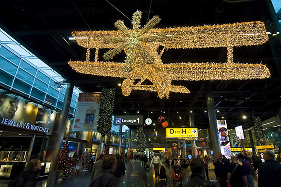 airplane in lights hanging from ceiling at Schiphol airport